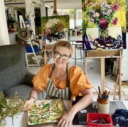 Helen Evans painting in her studio