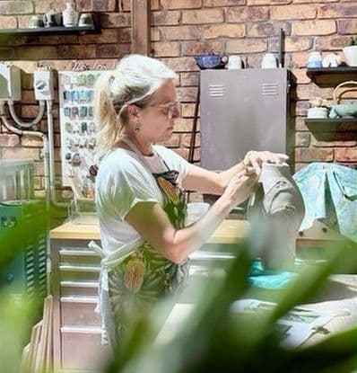 Marlyn Radley shaping a piece in her studio